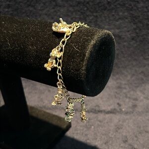 Disney Charm Bracelet with 6 Character Charms. Vintage Gold Tone. 7 inches long